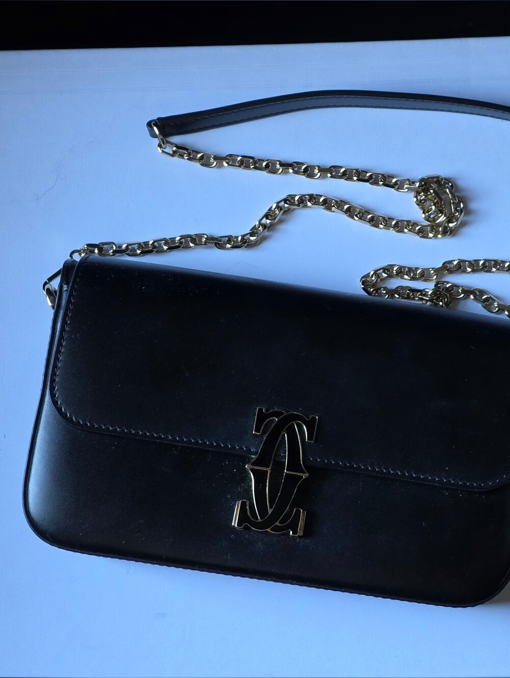 Cartier Black Leather Crossbody with Gold Chain Strap